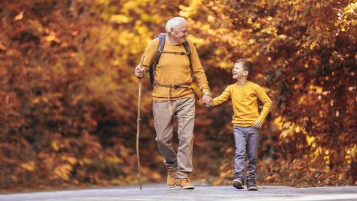 Man hiking with his grandson