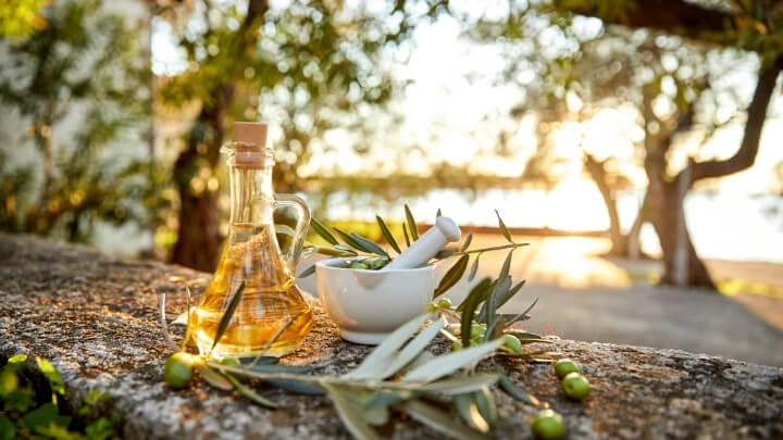 Olive oil on a rural wall by the Mediterranean