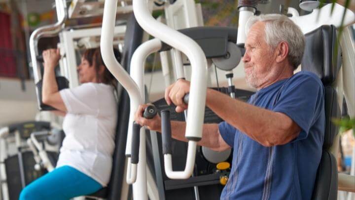 Older man working out in the gym