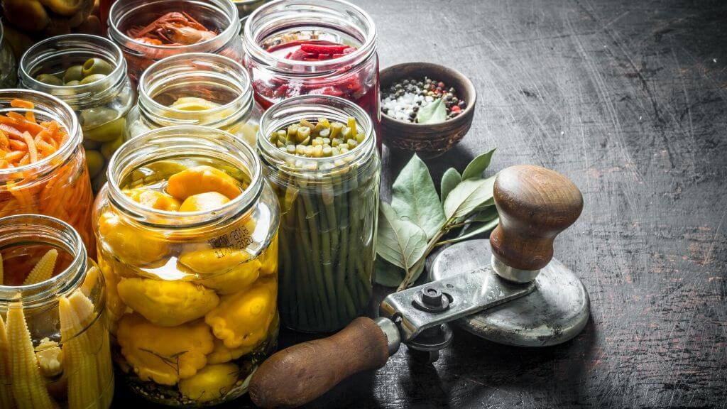 Pickled vegetables in glass jars