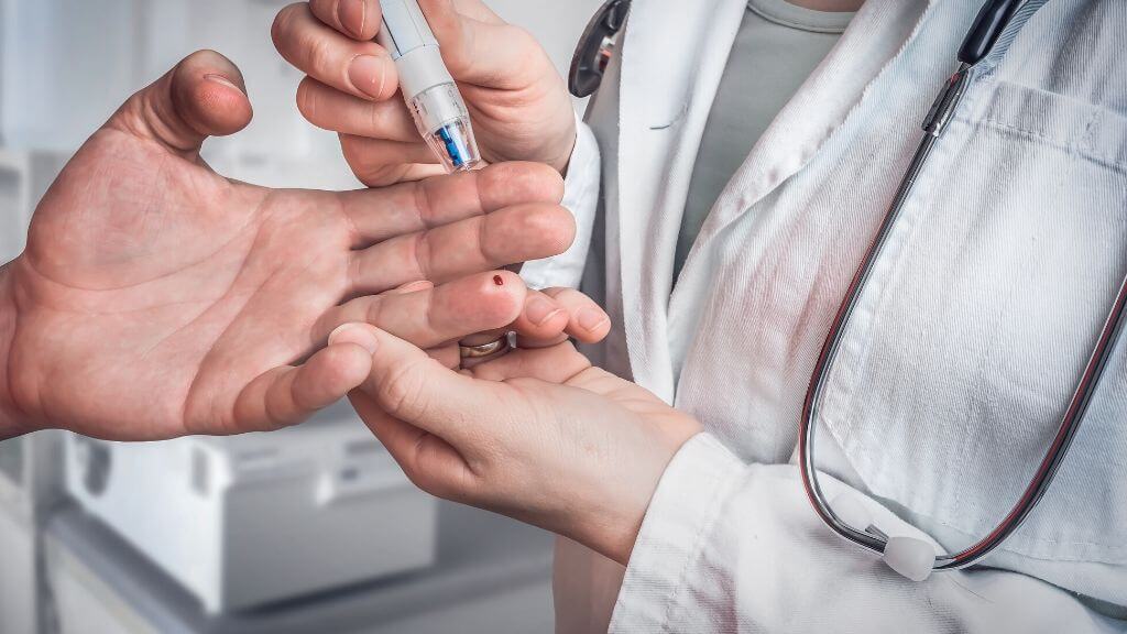 a close-up of hands holding a syringe