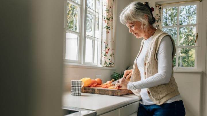 Woman preparing dinner at home