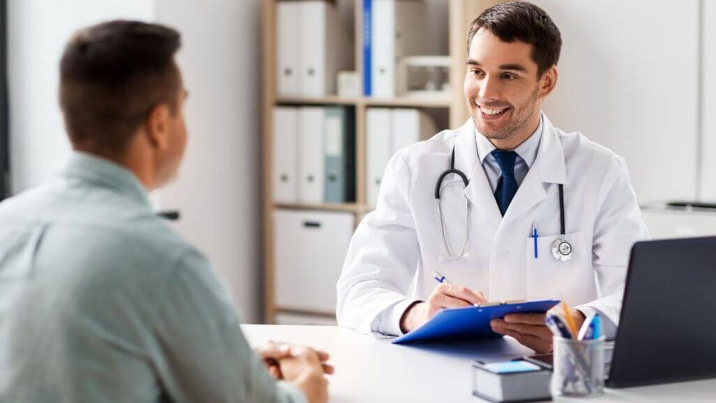 a man in a white coat