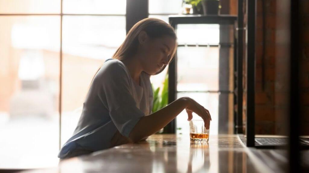 a woman sitting at a table