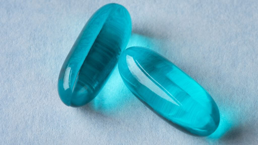 a close-up of some blue pills