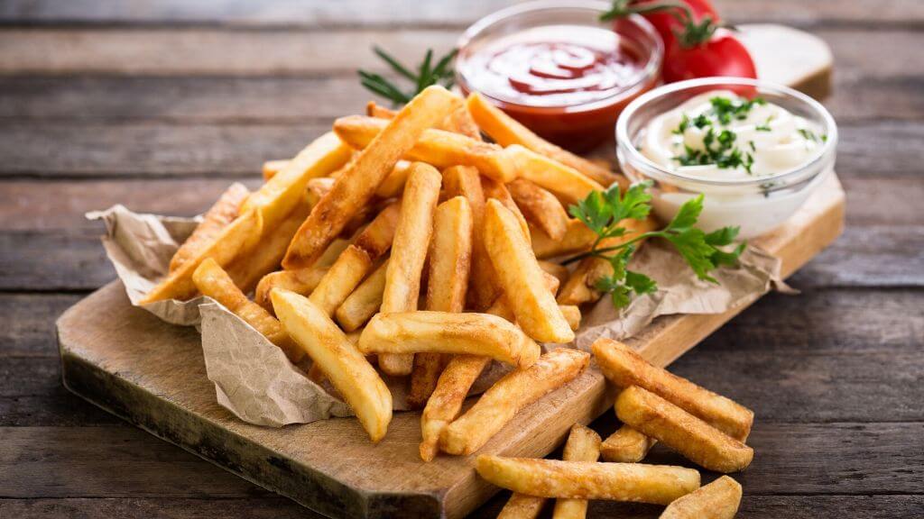 Fries with ketchup and mayonaise