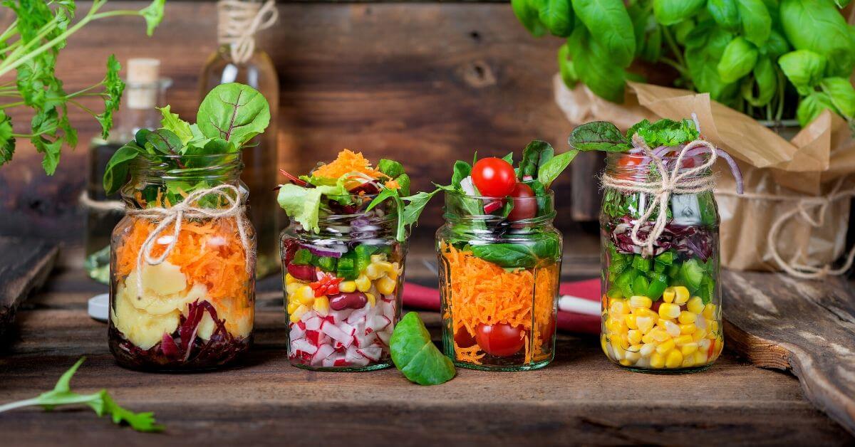 Fresh vegetables in mason jars