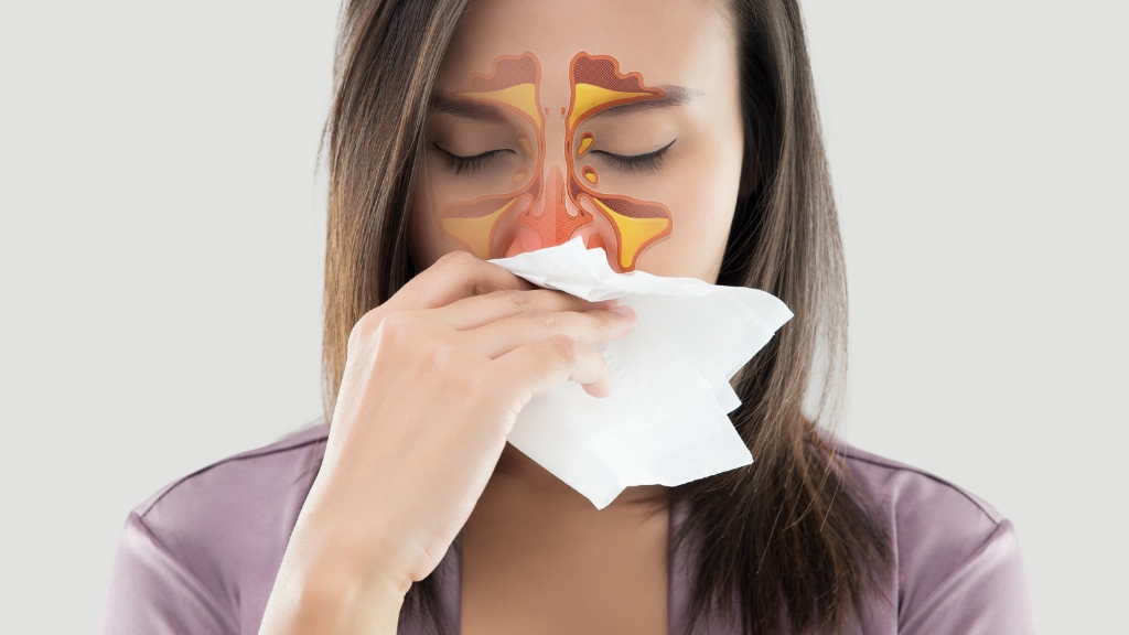 a woman holding a piece of paper