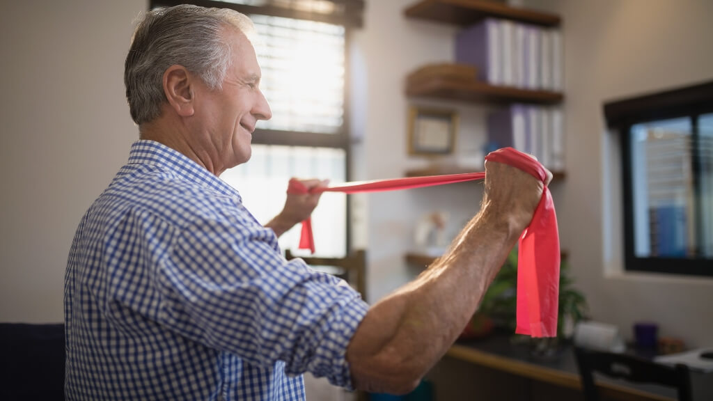 a man holding a red object