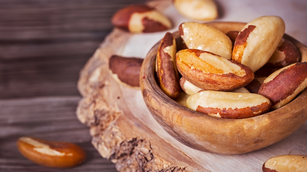 a group of sausages on a wooden surface