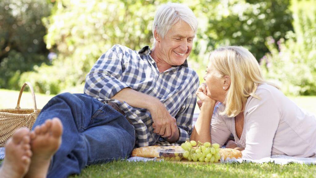 Older couple having a picnic