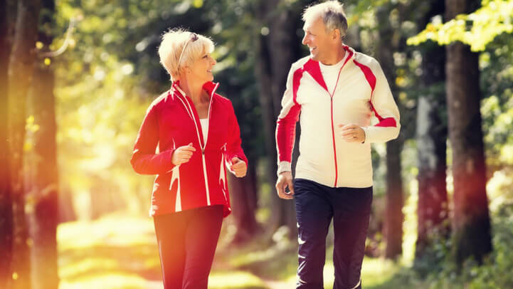 Middle aged couple jogging