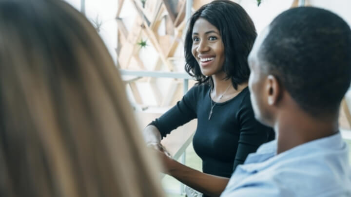 Employees talking about their work