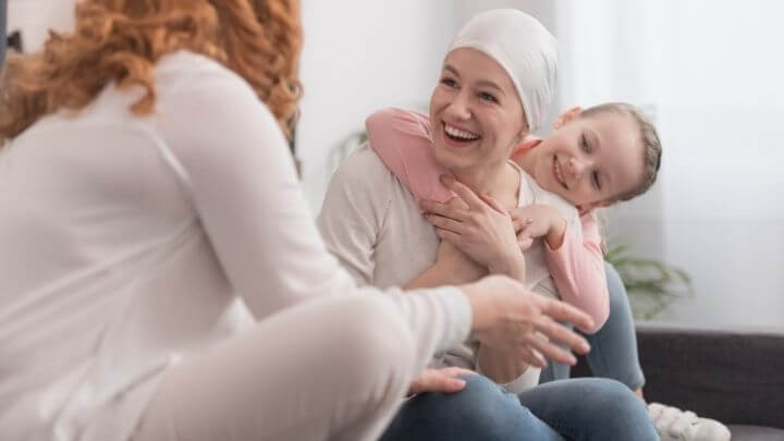 Healing woman with family