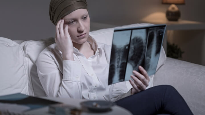 A woman looking at her X-rays