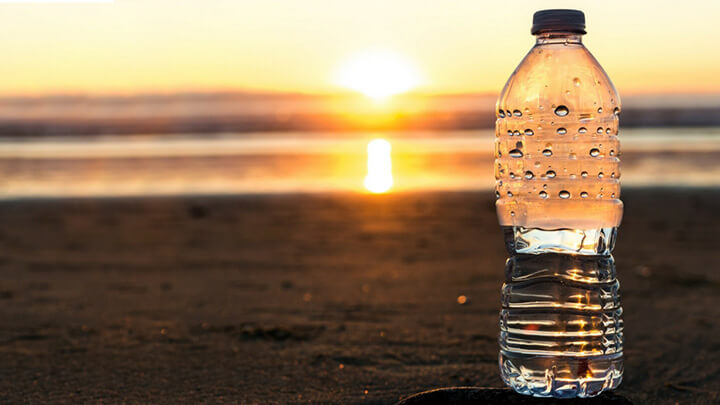 A plastic water bottle in the beach