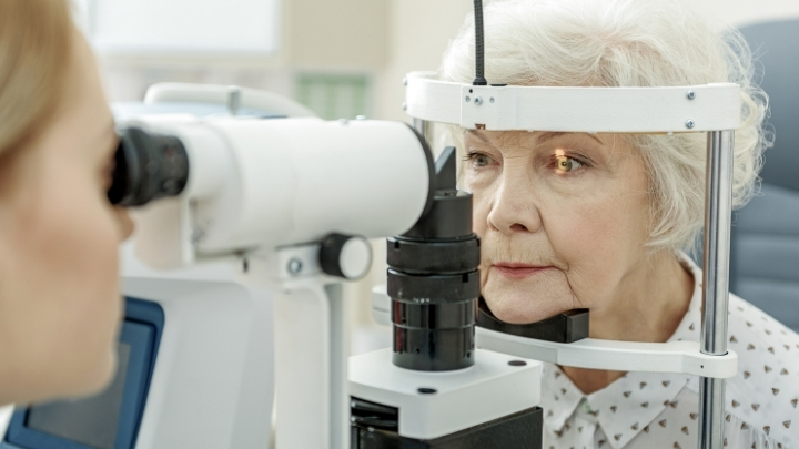 Senior woman getting her eyes checked