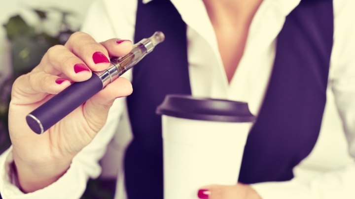 A woman with her vape pen