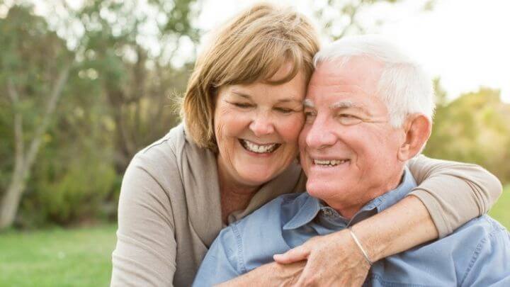 Older couple embracing each other