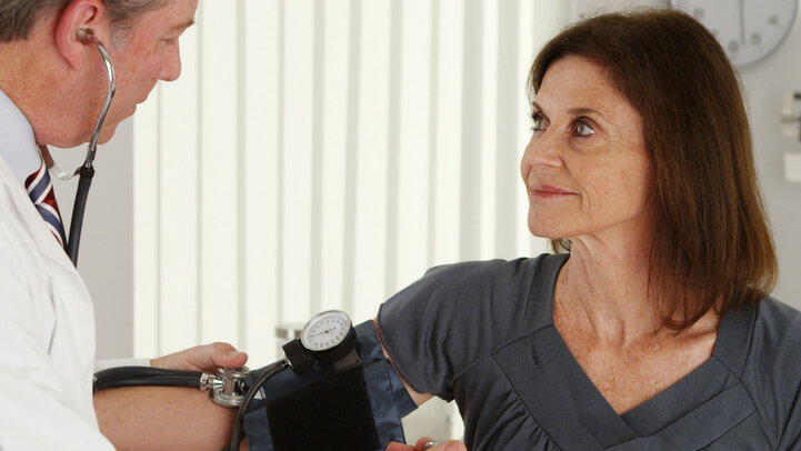 A middle aged woman at her doctor's office