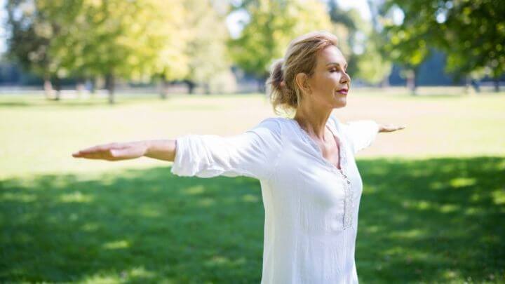 Woman doing yoga in the park