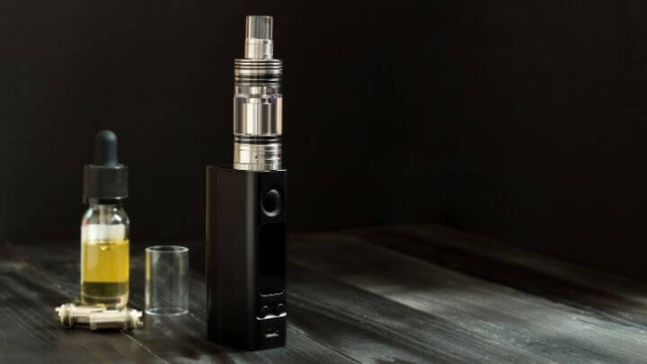 A vaping device with its liquid