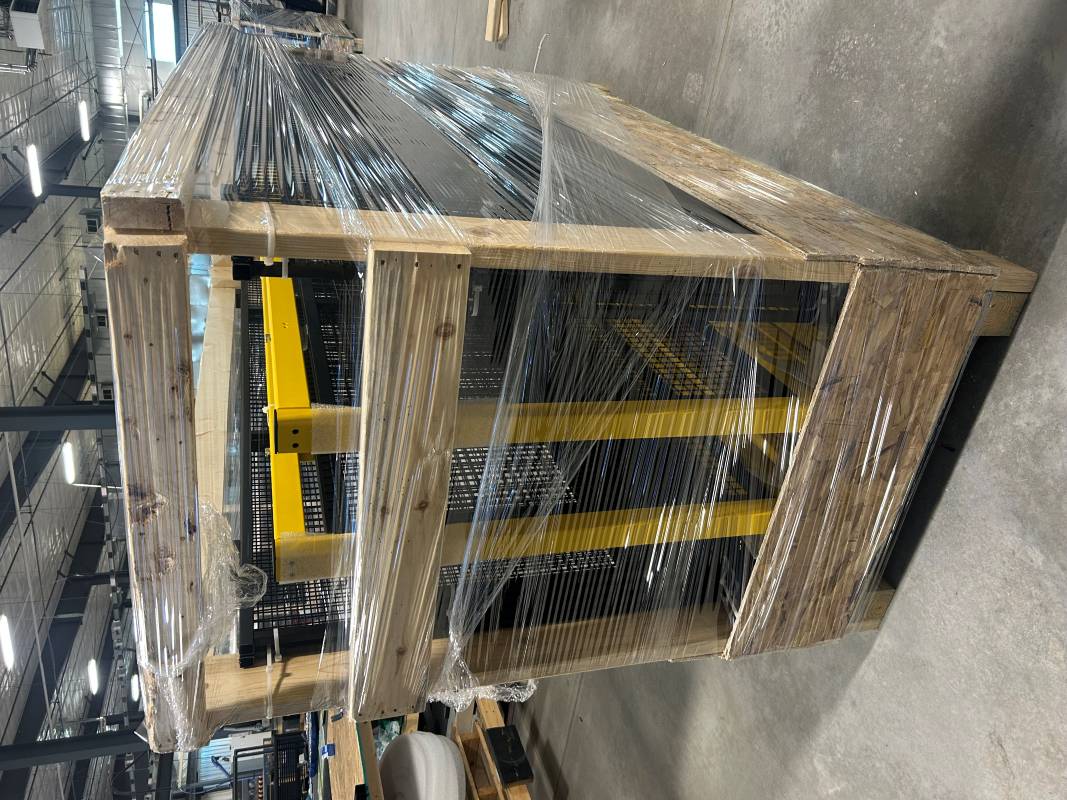 Removable OSB bottom panel on AMGS crate for easy post access