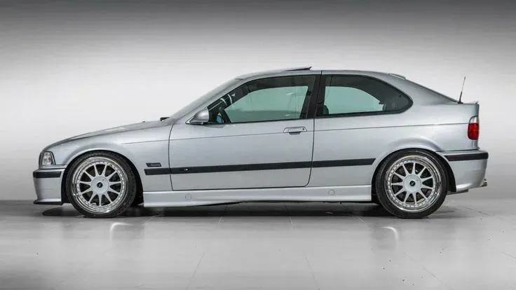Before: Silver hatchback