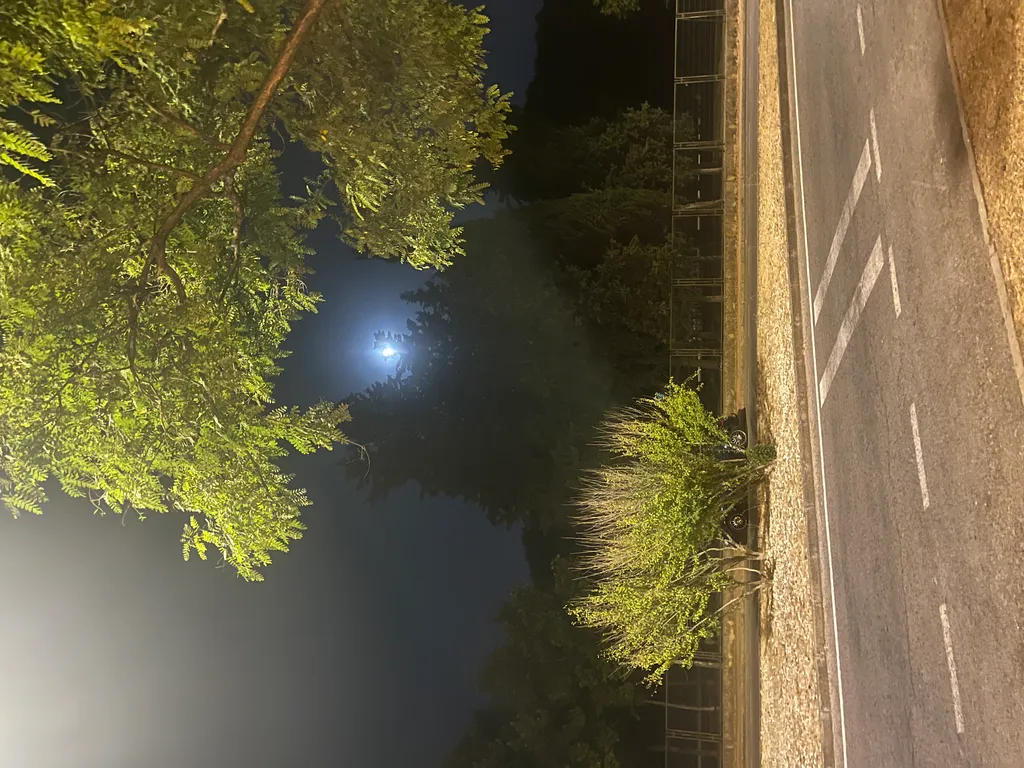 Before: Night photo of an empty road