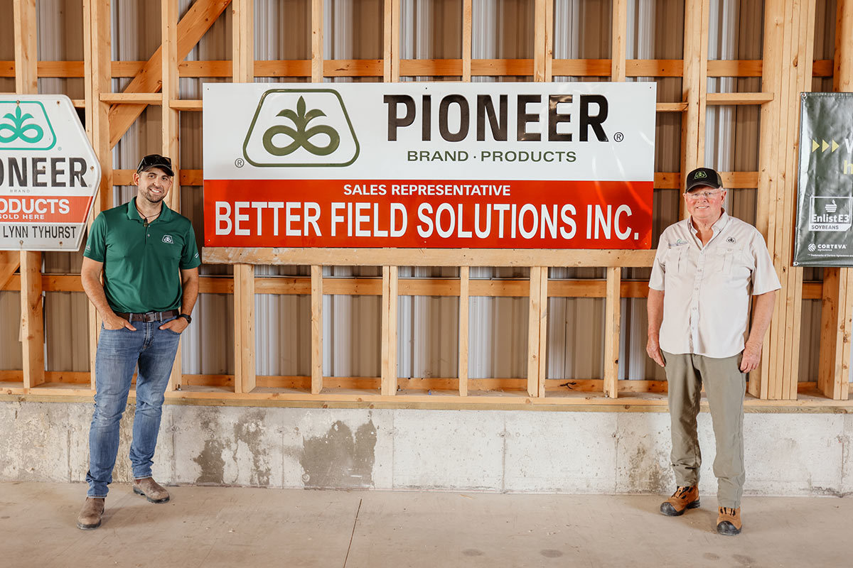 Better Field Solutions Inc. | Tom and Brad Standing In Front Of Company Sign