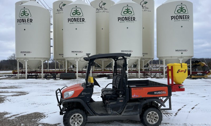 Pioneer seed silos and utility vehicle used for small seed spreading services