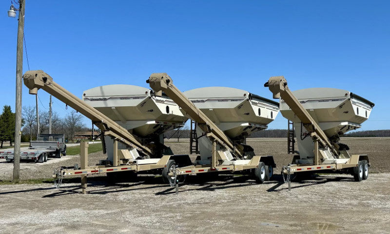 Bulk seed tender trailers with conveyor augers ready for field delivery
