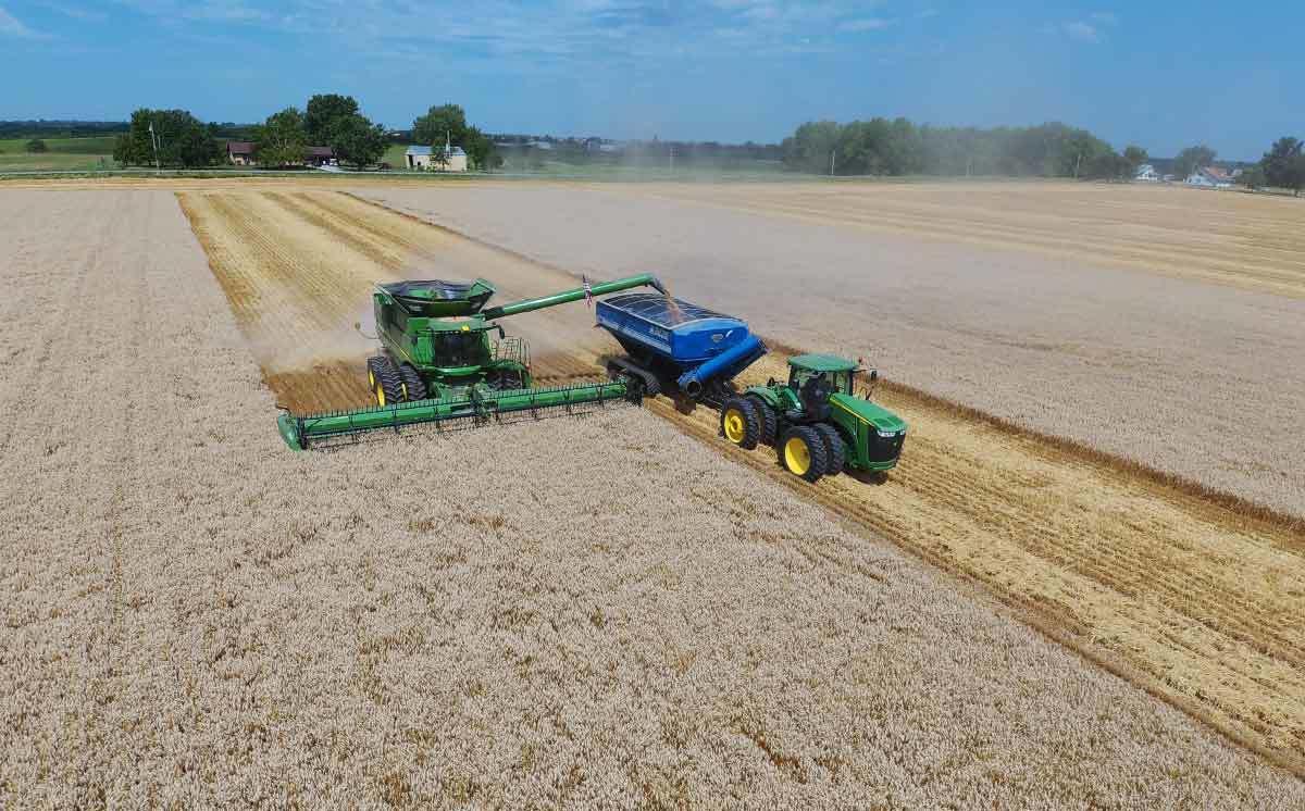 Inset Combine Harvesting Wheat