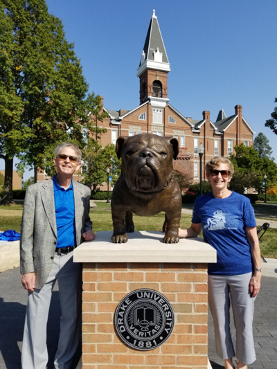 Gary and Melissa Porter in front of Drake University bulldog statue