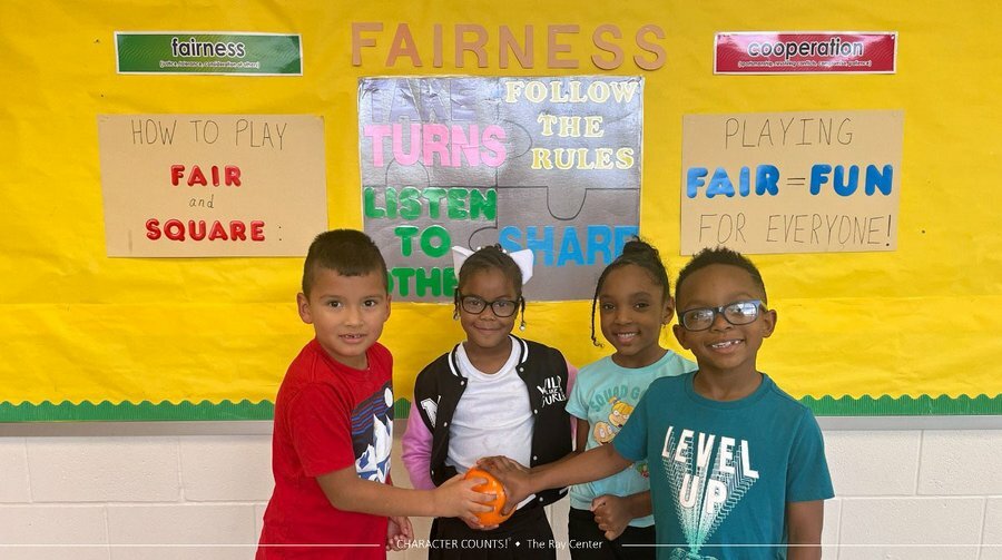 Kids in front of board