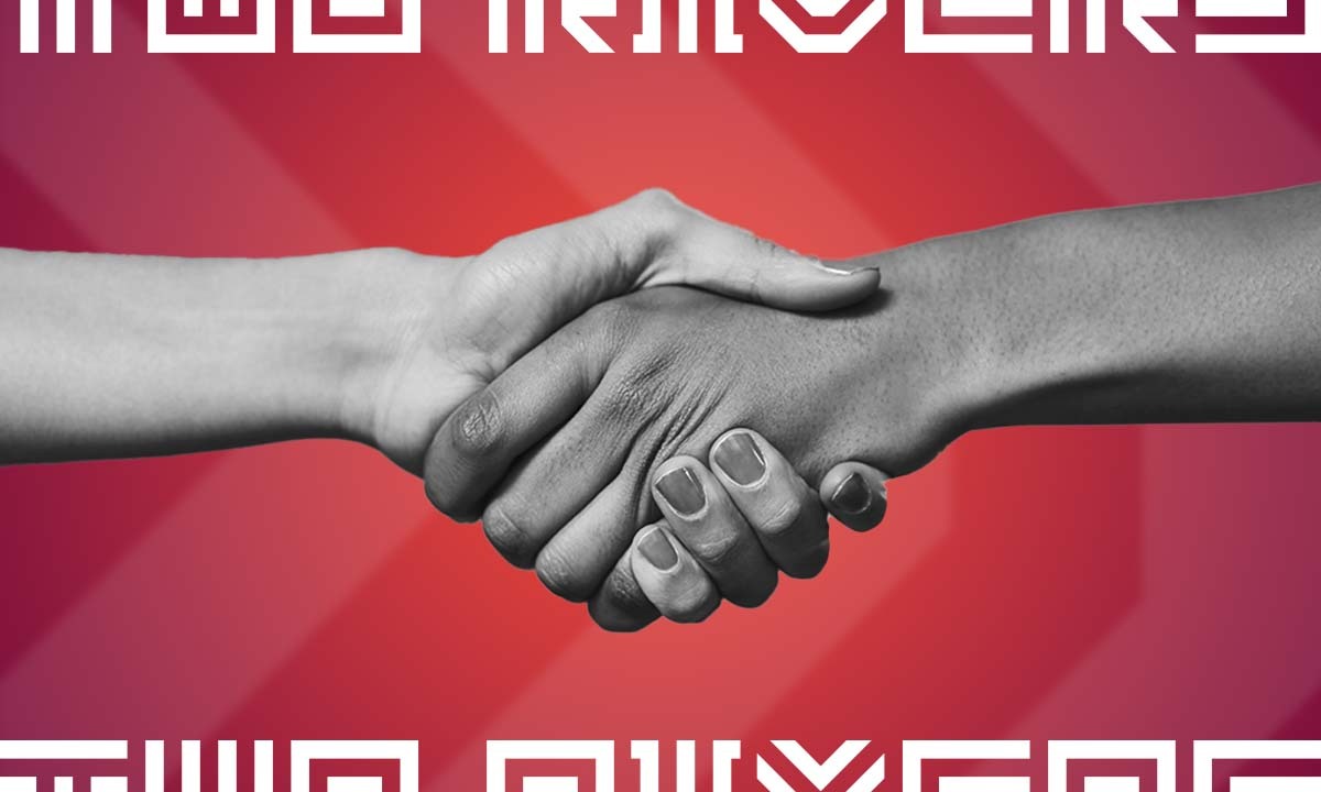 A photo of two people shaking hands