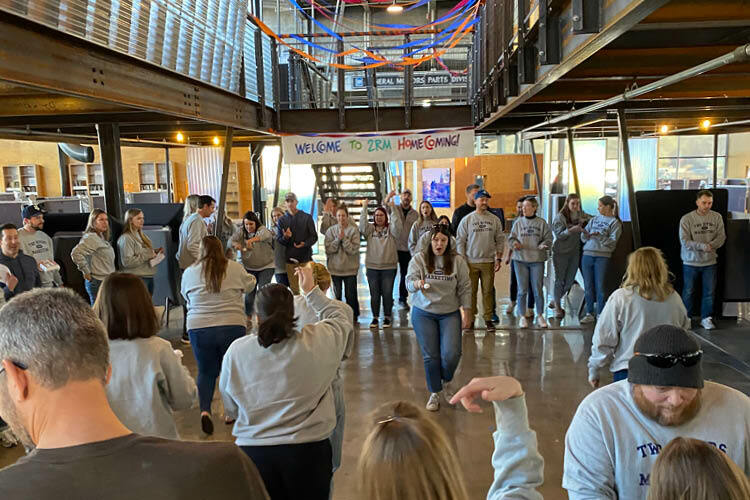 Image of associates playing an egg relay race