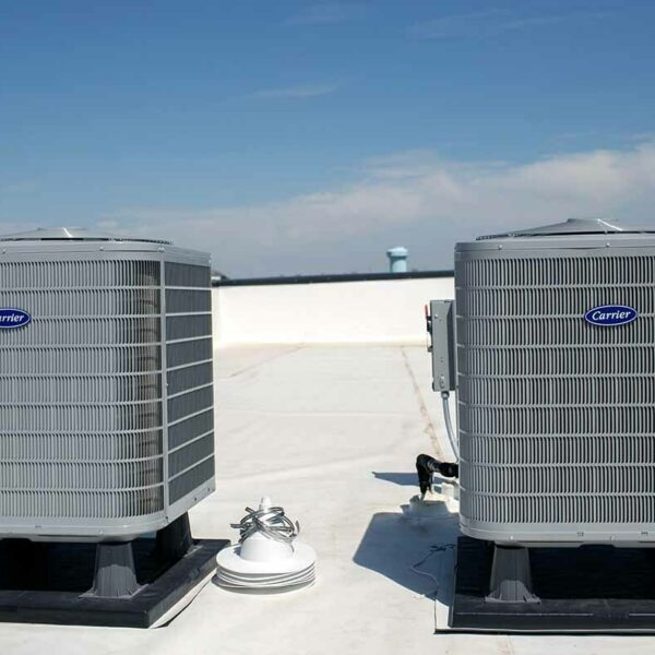 Two Rooftop Carrier HVAC Units