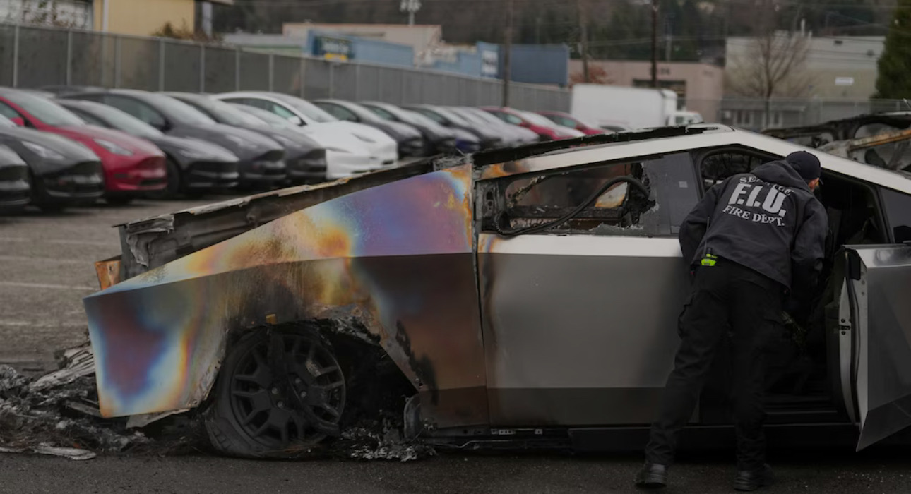 The aftermath of a domestic terrorist attack on a Tesla dealership