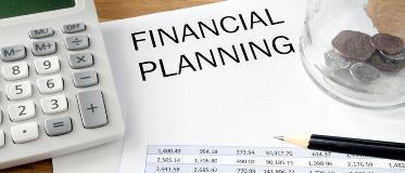 Why is it critical to review a financial plan regularly?