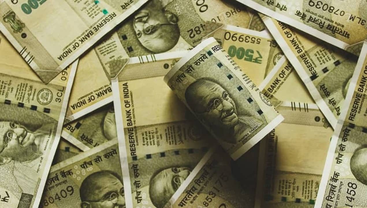 Why the rupee fell to a fresh record low against dollar