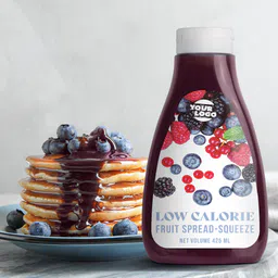 Private label amerpharma low calorie fruit spread in squeeze in 425 ml bottle with pancakes with fruit on plate