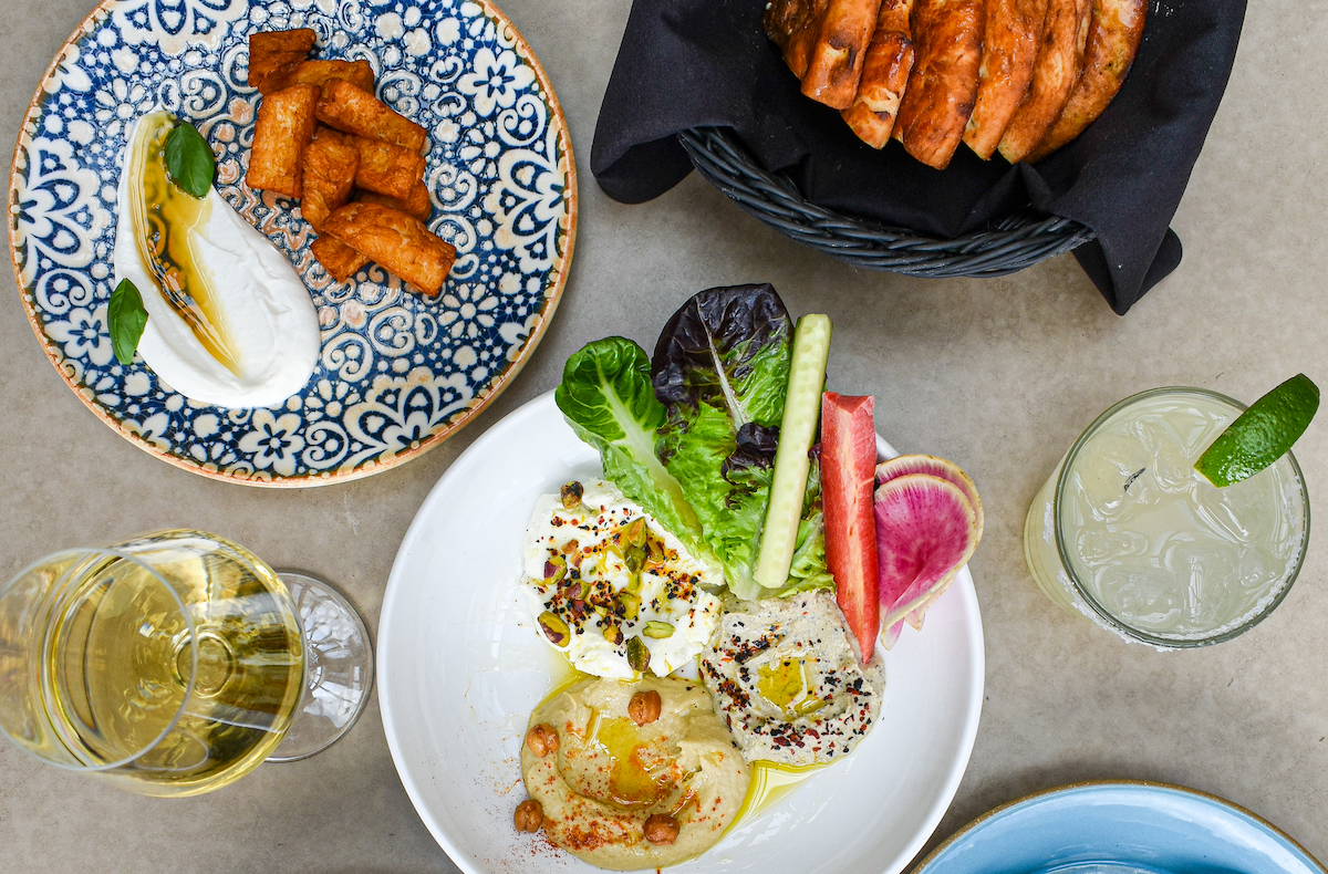 Photo of spreads and happy hour offerings