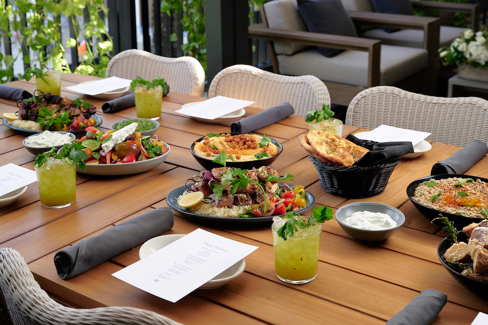 Aba hummus station. An image of bread and hummus