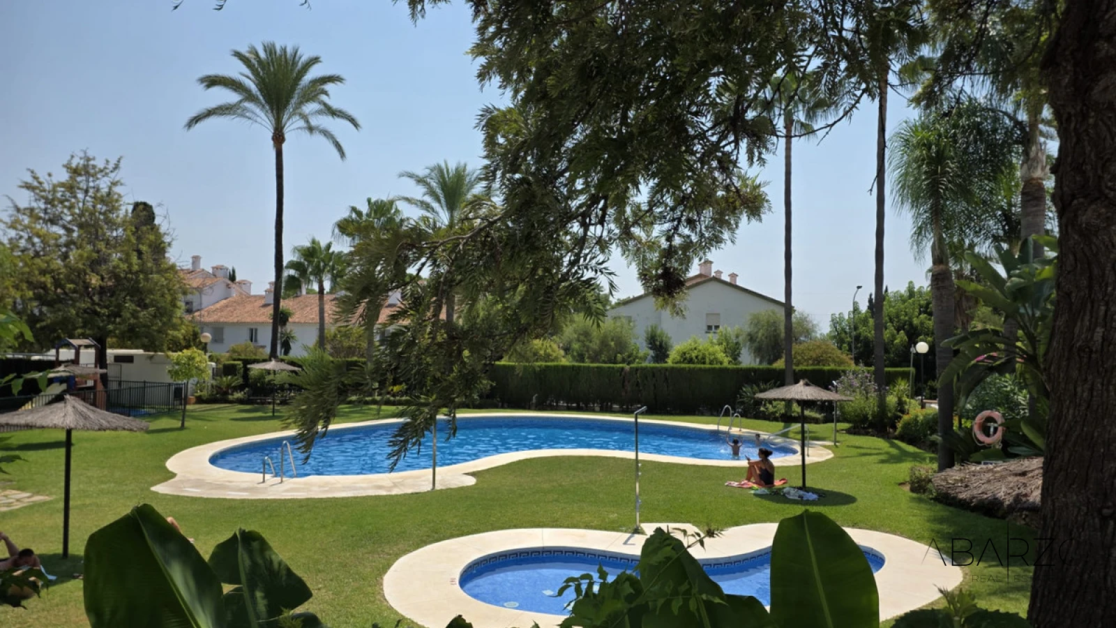 Corner townhouse in Nagüeles, Marbella with sea views and private garden — luxury property for sale in Golden Mile, Marbella