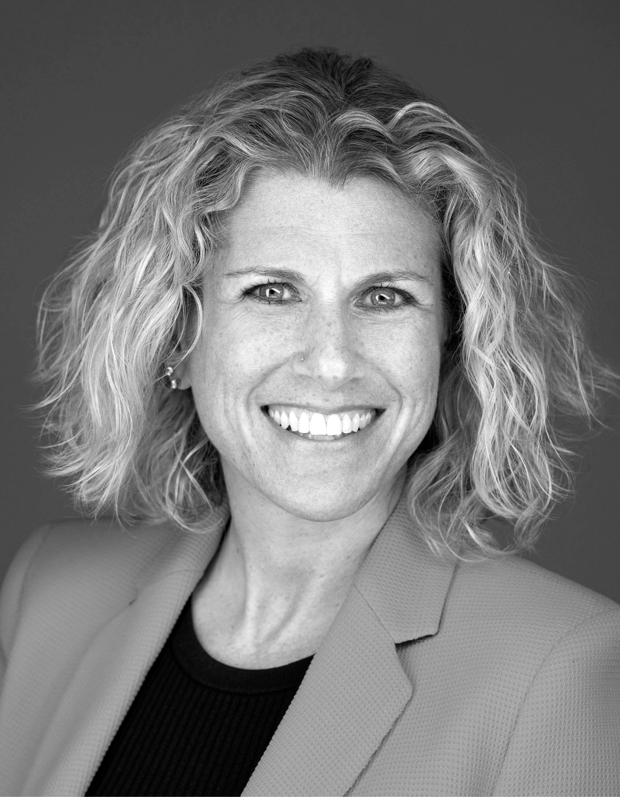 Black and white headshot of Brandee Dallow