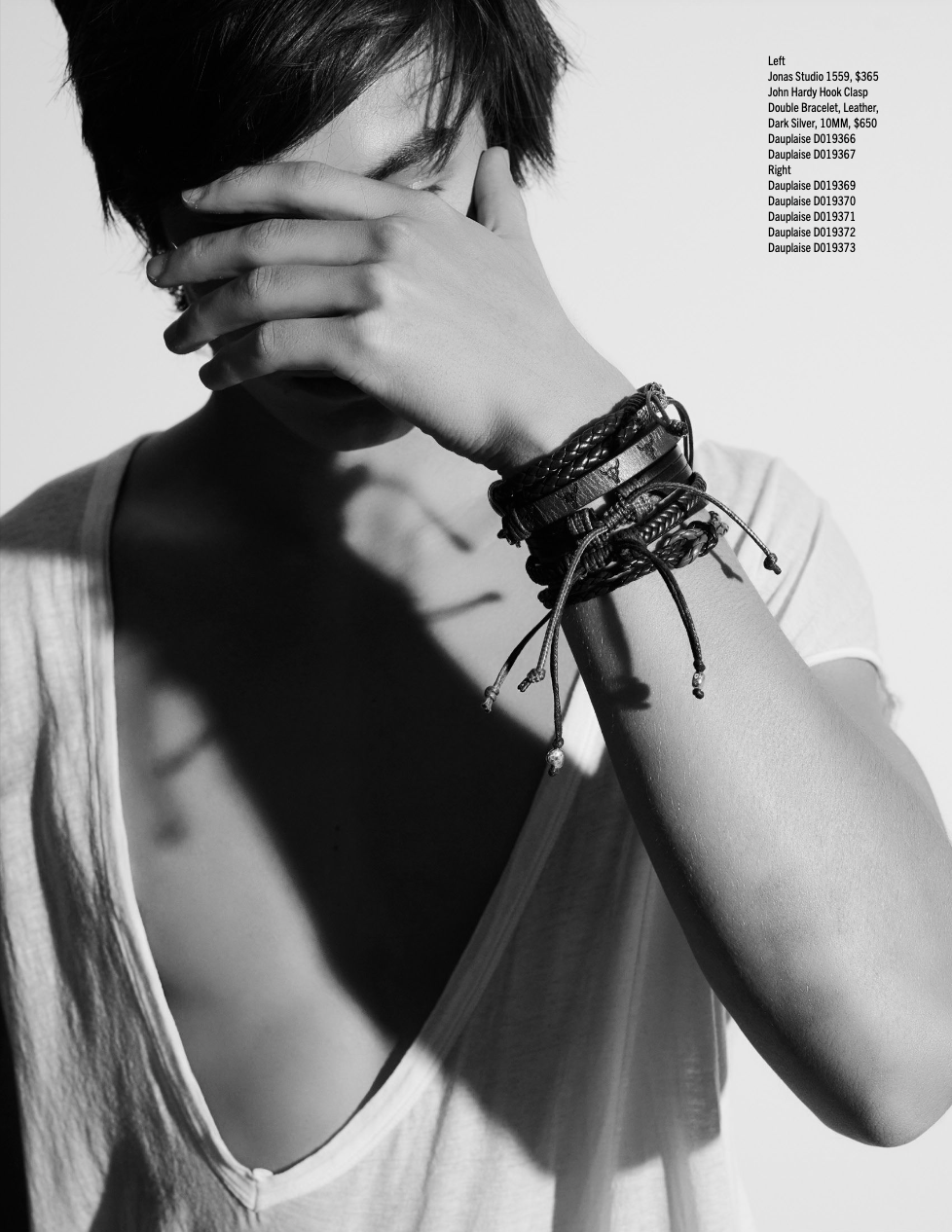 Model Noah Webber in a black & white image wearing Dauplaise leather men's wrap jewelry