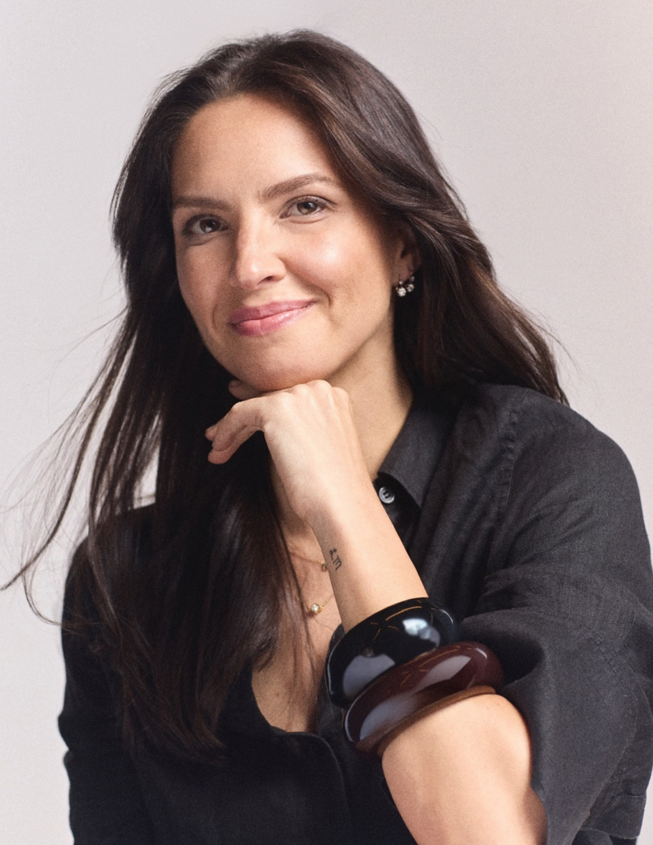 Headshot of Emily Cole in a studio setting