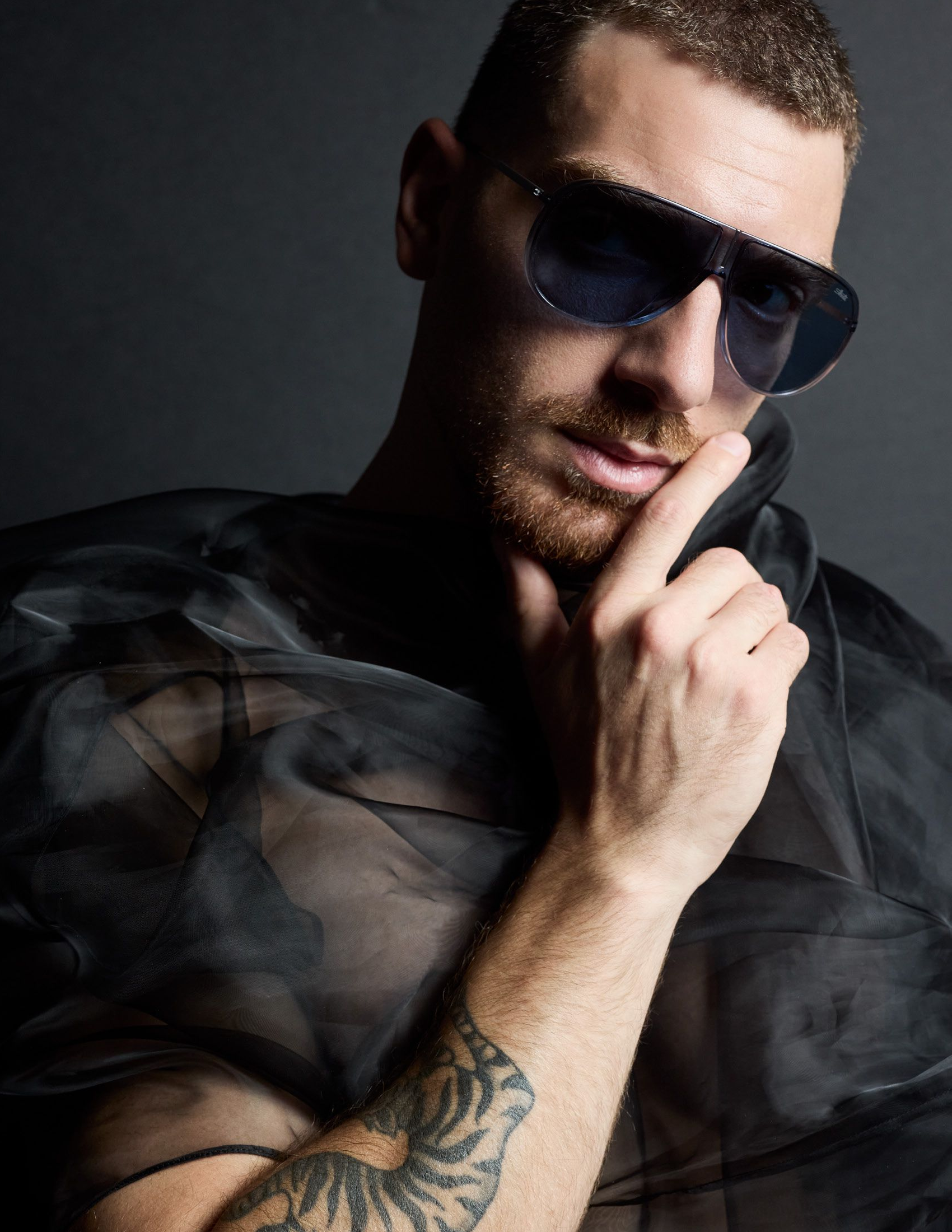 Model Francesco Donvito wearing Silhouette sunglasses.