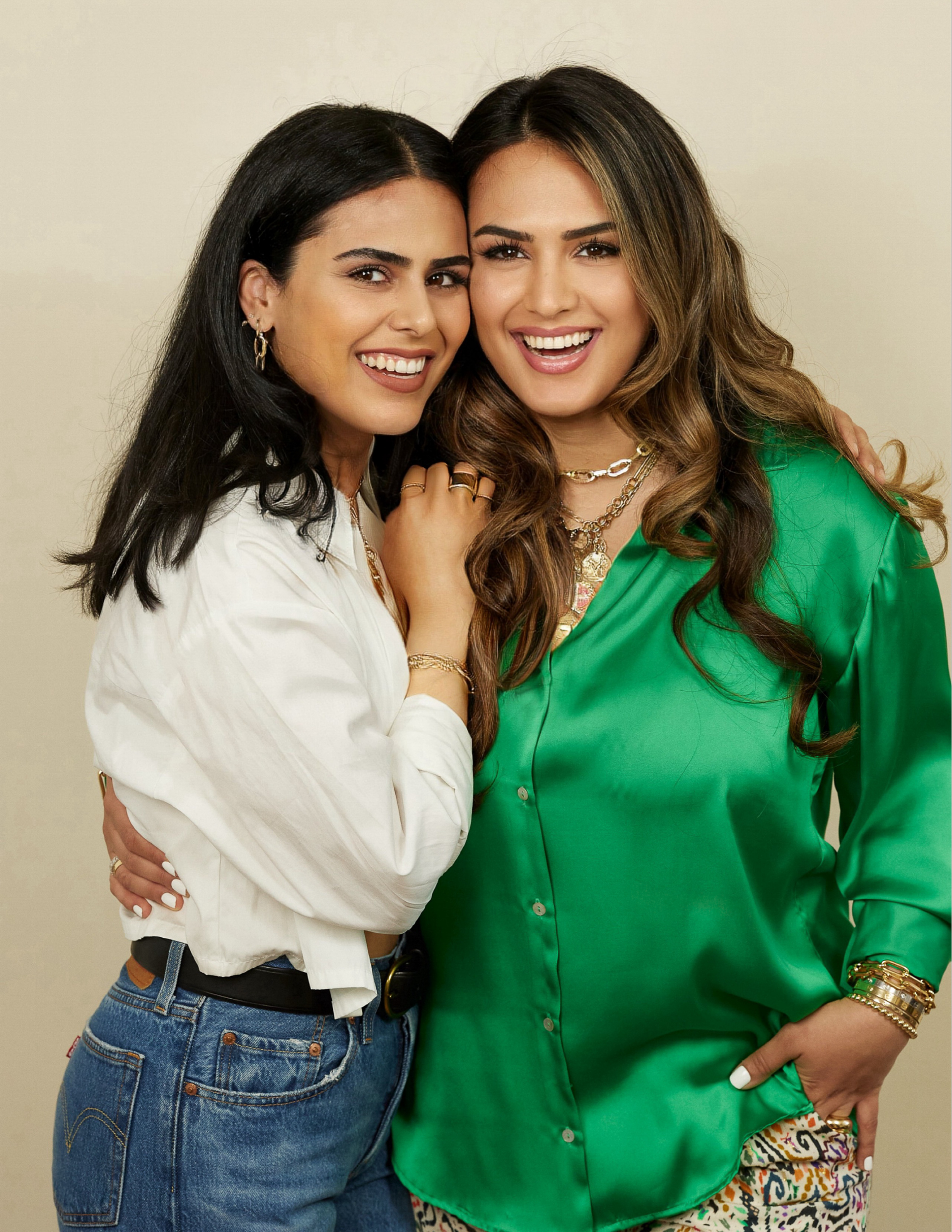 Joy and Sarah Haugaard, the founders of LIONHEART, hugging in a headshot.